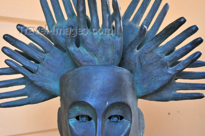 sardinia3: Olbia / Terranoa / Tarranoa, Olbia-Tempio province, Sardinia / Sardegna / Sardigna: modern art at the City Hall - head with a crown of hands - sculpture - photo by M.Torres - (c) Travel-Images.com - Stock Photography agency - Image Bank