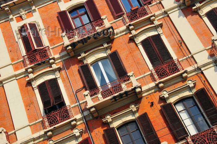 sardinia339: Cagliari, Sardinia / Sardegna / Sardigna: Art Nouveau balcony railings and the French shutters of palazzo Leone Manca - Via Roma - quartiere Marina - photo by M.Torres - (c) Travel-Images.com - Stock Photography agency - Image Bank