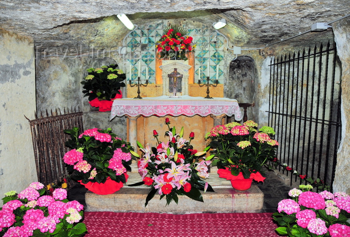 sardinia379: Cagliari, Sardinia / Sardegna / Sardigna: Crypt of Sant'Efisio, located 9 m below street level - marble altar with 'azulejos' - Prison of Sant'Efisio - used in WWII as an air raid shelter when the Americans bombed civilian targets in Cagliari - Cripta di Sant'Efisio - ipogeo situato a 9 m sotto il livello stradale - carcere di Sant'Efisio - via Sant'Efisio - Chiesa di Sant'Efisio - quartiere di Stampace - photo by M.Torres - (c) Travel-Images.com - Stock Photography agency - Image Bank