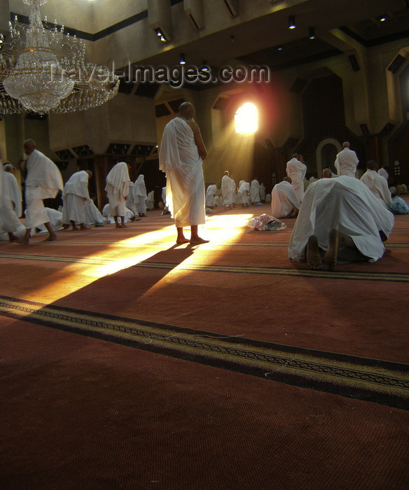 saudi-arabia164: Mecca / Makkah, Saudi Arabia: a hajji prays in Tanaeim mosque - pure white Ihram tunics - photo by A.Faizal - (c) Travel-Images.com - Stock Photography agency - Image Bank