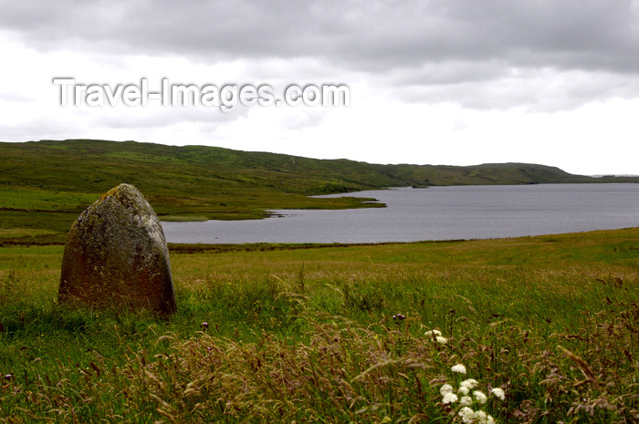scot188: Scotland - Islay Island - Loch Finlaggan: view of an ancient standing stone, one of many found on Islay - photo by C.McEachern - (c) Travel-Images.com - Stock Photography agency - Image Bank