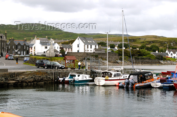 scot197: Scotland - Islay Island - Port Ellen: a view of part of the harbor with small boats moored to the wharf and the town in the background - photo by C.McEachern - (c) Travel-Images.com - Stock Photography agency - Image Bank