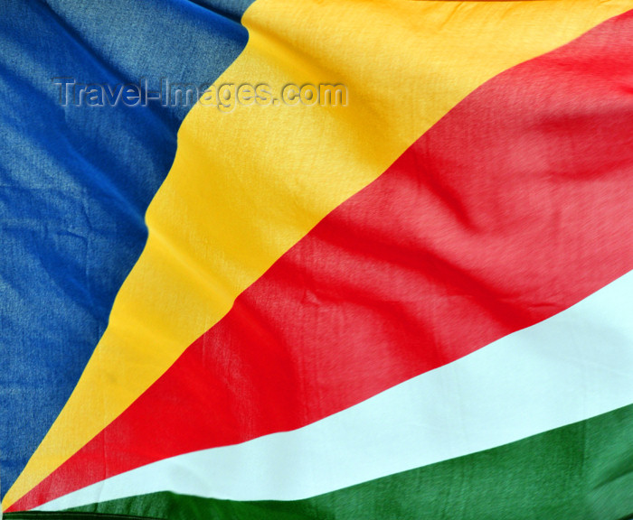 seychelles122: Mahe, Seychelles: Eden Island - Seychelles flag in the wind - photo by M.Torres - (c) Travel-Images.com - Stock Photography agency - Image Bank