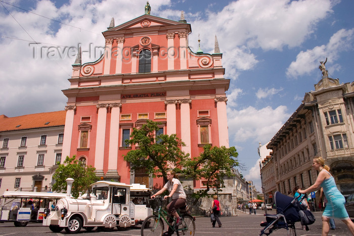 slovenia102: Franciscan church of the Annunciation and Presernov trg  - people and tourist train, Ljubljana, Slovenia - photo by I.Middleton - (c) Travel-Images.com - Stock Photography agency - Image Bank