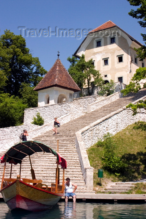 slovenia165: Slovenia - Pletna boat moored at the steps to the church of the Assumption on lake bled - photo by I.Middleton - (c) Travel-Images.com - Stock Photography agency - Image Bank