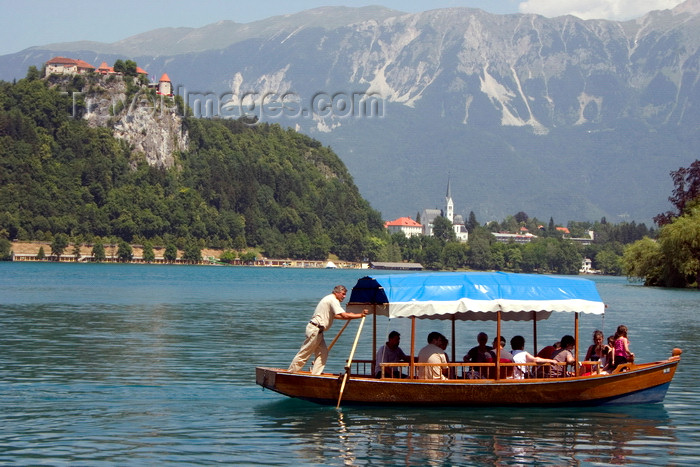 slovenia168: Slovenia - Pletna rowing tourists on lake Bled - photo by I.Middleton - (c) Travel-Images.com - Stock Photography agency - Image Bank