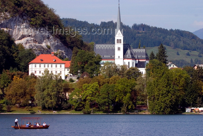 slovenia171: Slovenia - Gondolier rowing tourists across Lake Bled with Bled church in background - photo by I.Middleton - (c) Travel-Images.com - Stock Photography agency - Image Bank