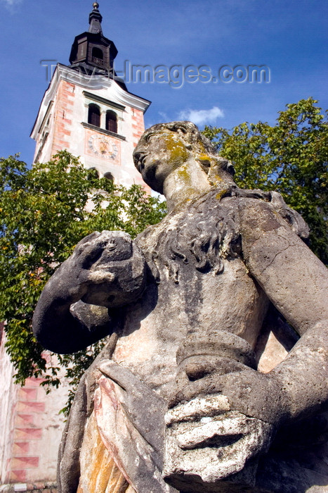 slovenia177: Slovenia - Statue of Mary Magdalene in front of the Island church on Lake Bled - photo by I.Middleton - (c) Travel-Images.com - Stock Photography agency - Image Bank