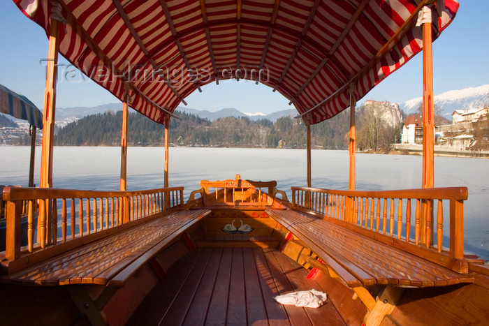 slovenia178: Slovenia - Pletna moored at Lake Bled - winter - frozen lake - Upper Carniola / Gorenjska region - Pokljuka plateau - photo by I.Middleton - (c) Travel-Images.com - Stock Photography agency - Image Bank