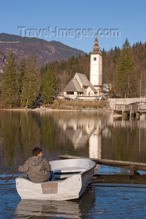 slovenia201: Slovenia - Ribcev Laz - boat and church - Bohinj Lake in Spring - photo by I.Middleton - (c) Travel-Images.com - Stock Photography agency - Image Bank