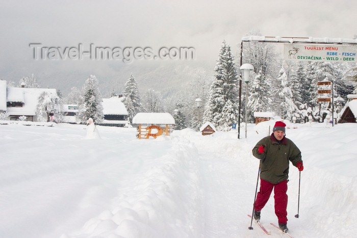 slovenia209: Slovenia - Man cross country skiing in the village Ribcev Laz near Bohinj Lake - photo by I.Middleton - (c) Travel-Images.com - Stock Photography agency - Image Bank