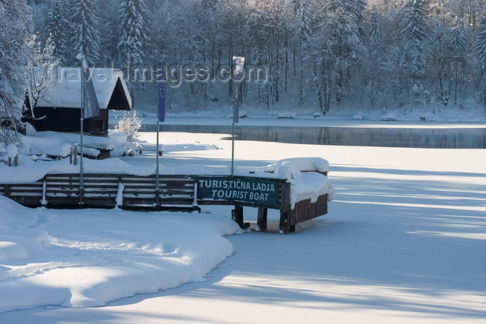 slovenia220: Slovenia - Bohinj Lake starting to freeze over - tourist boat pier - photo by I.Middleton - (c) Travel-Images.com - Stock Photography agency - Image Bank