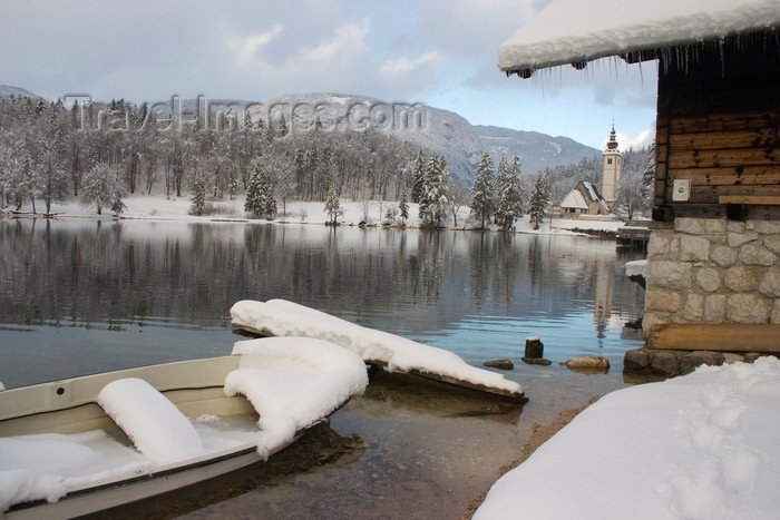 slovenia237: Slovenia - Ribcev Laz - frozen boat - view across Bohinj Lake in winter - photo by I.Middleton - (c) Travel-Images.com - Stock Photography agency - Image Bank