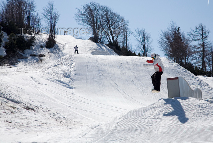 slovenia242: Slovenia - Snowboarder on Vogel mountain in Bohinj - jump - photo by I.Middleton - (c) Travel-Images.com - Stock Photography agency - Image Bank