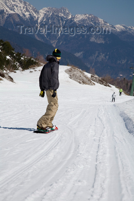 slovenia248: Slovenia - snowboarder on Vogel mountain in Bohinj - Julian Alps on the horizon - photo by I.Middleton - (c) Travel-Images.com - Stock Photography agency - Image Bank