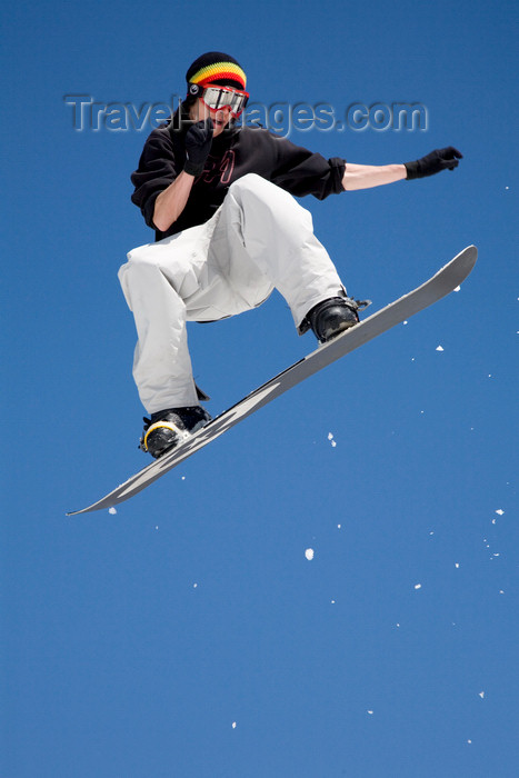 slovenia256: Slovenia - Snowboarder on Vogel mountain in Bohinj - flying and posing - photo by I.Middleton - (c) Travel-Images.com - Stock Photography agency - Image Bank