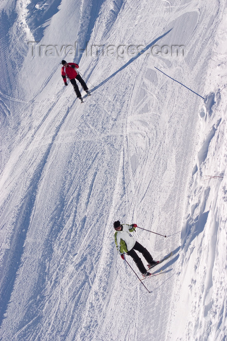 slovenia266: Slovenia - skiers speed down Vogel mountain in Bohinj - photo by I.Middleton - (c) Travel-Images.com - Stock Photography agency - Image Bank