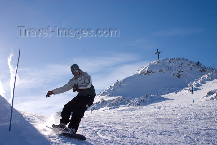 slovenia270: Slovenia - hill with cross and snowboarder on Vogel mountain in Bohinj - photo by I.Middleton - (c) Travel-Images.com - Stock Photography agency - Image Bank