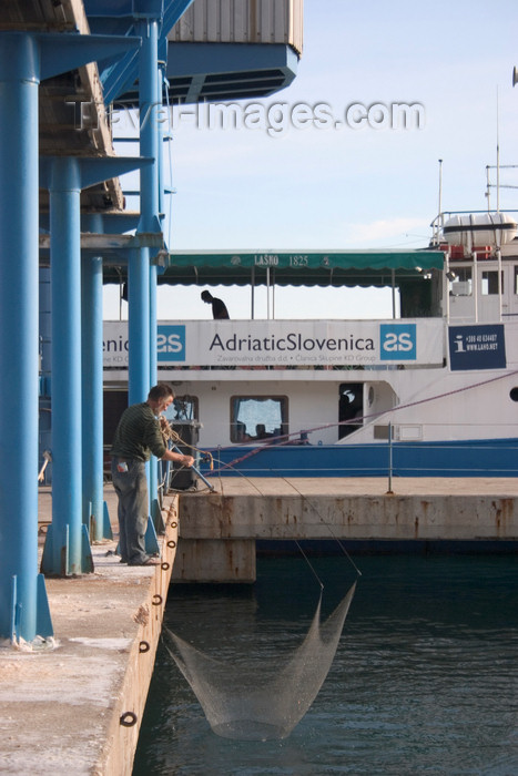 slovenia386: Slovenia - Portoroz: ferry and Asian fishing methods - seafront, Adriatic coast - photo by I.Middleton - (c) Travel-Images.com - Stock Photography agency - Image Bank