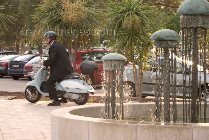 slovenia387: Slovenia - Portoroz: medusa fountain and scooter - photo by I.Middleton - (c) Travel-Images.com - Stock Photography agency - Image Bank