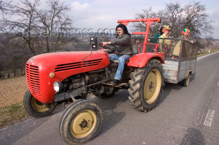 slovenia507: tractor in a Pust parade - a traditional celebration where people dress up to scare off the winter - Fokovci, Prekmurje, Slovenia - photo by I.Middleton - (c) Travel-Images.com - Stock Photography agency - Image Bank