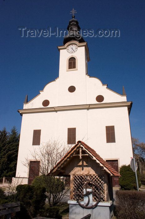 slovenia515: water pump and Lutheran church - Bodonci, Puconci municipality, Prekmurje, Slovenia - photo by I.Middleton - (c) Travel-Images.com - Stock Photography agency - Image Bank