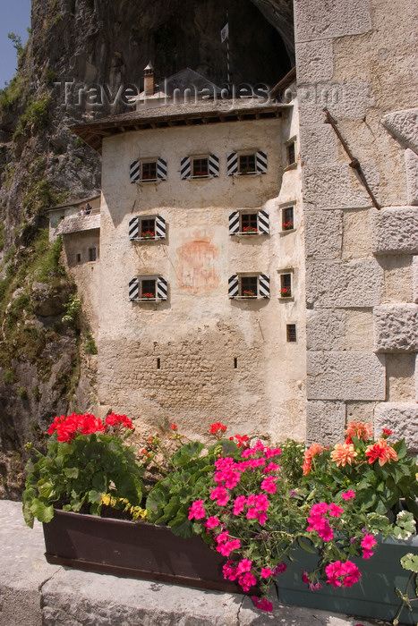 slovenia534: Predjama castle - Predjamski Grad - flower pots, Slovenia - photo by I.Middleton - (c) Travel-Images.com - Stock Photography agency - Image Bank