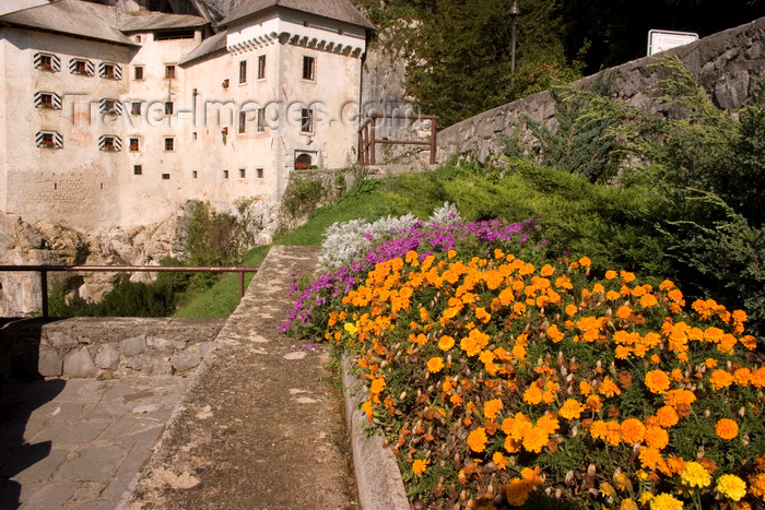 slovenia550: Predjama castle - flowers, Slovenia - photo by I.Middleton - (c) Travel-Images.com - Stock Photography agency - Image Bank