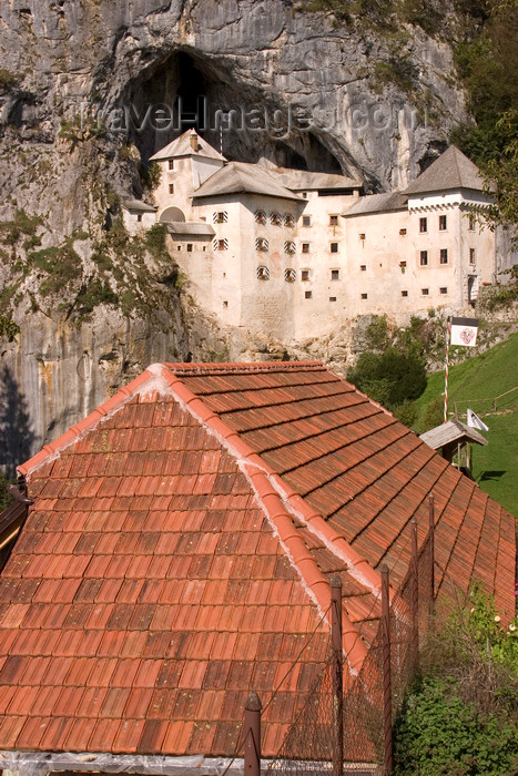 slovenia552: Predjama castle and red roof, Slovenia - photo by I.Middleton - (c) Travel-Images.com - Stock Photography agency - Image Bank