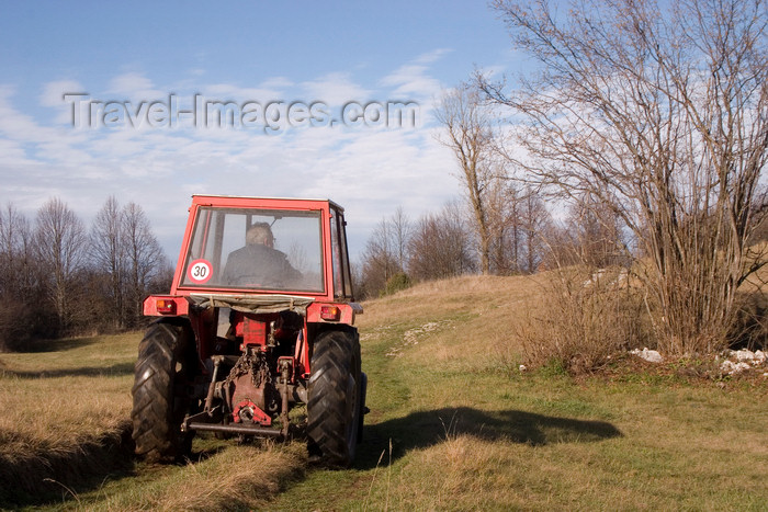 slovenia555: Slovenia - Pivka Valley: farmer driving tractor - Karst region  - photo by I.Middleton - (c) Travel-Images.com - Stock Photography agency - Image Bank