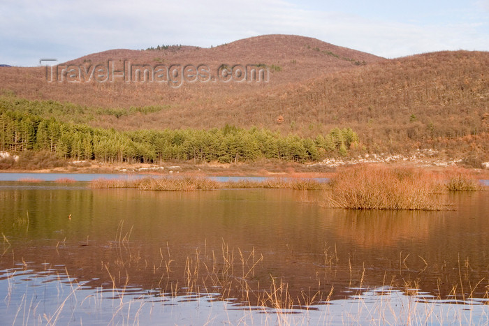 slovenia560: Slovenia - Pivka Valley: hills reflected in Palsko lake - Pivka intermittent lakes appear when high karst waters flood large and small karst depressions - photo by I.Middleton - (c) Travel-Images.com - Stock Photography agency - Image Bank