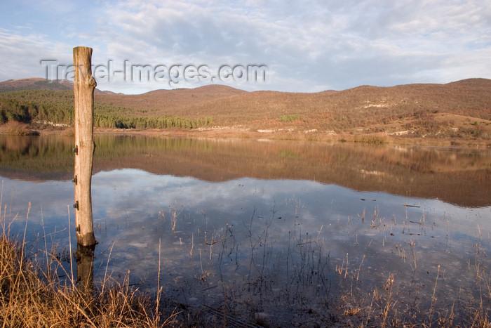 slovenia566: Slovenia - Pivka Valley: Palsko lake - pole and reflection fo the sky - photo by I.Middleton - (c) Travel-Images.com - Stock Photography agency - Image Bank