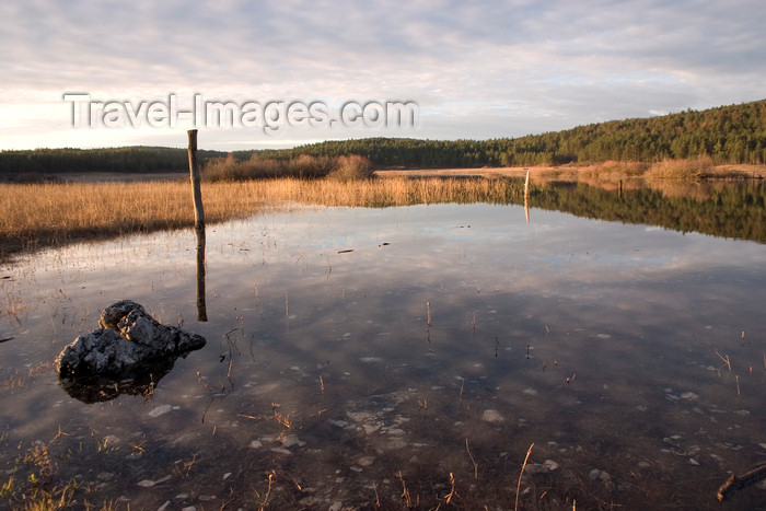 slovenia567: Slovenia - Pivka Valley: Palsko lake - pole and rock - photo by I.Middleton - (c) Travel-Images.com - Stock Photography agency - Image Bank