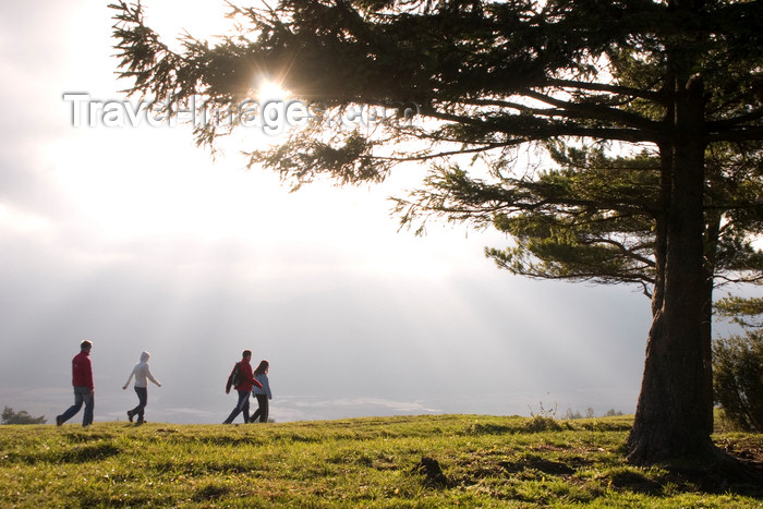 slovenia587: Slovenia - Cerknica municipality: Hikers on Slivnica Mountain as sun goes down over Cerknica Lake - southern part of Cerknica polje - photo by I.Middleton - (c) Travel-Images.com - Stock Photography agency - Image Bank