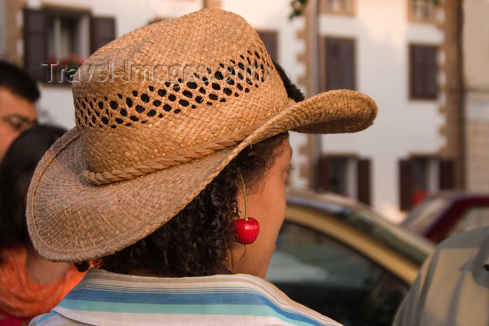 slovenia601: Slovenia - woman with cherry in ear in the Goriska Brda wine region - photo by I.Middleton - (c) Travel-Images.com - Stock Photography agency - Image Bank