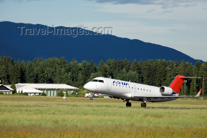 slovenia621: Slovenia - Brnik Airport: Adria Airways Canadair Regional Jet CRJ200LR S5-AAD airplane taking off from Ljubljana Joze Pucnik Airport - photo by I.Middleton - (c) Travel-Images.com - Stock Photography agency - Image Bank