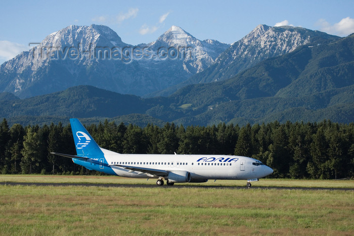 slovenia630: Slovenia - Brnik Airport: Adria Airways Boeing 737-4C9 UR-GAV preparing to take off from Ljubljana Joze Pucnik Airport - photo by I.Middleton - (c) Travel-Images.com - Stock Photography agency - Image Bank