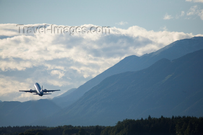 slovenia631: Slovenia - Brnik Airport: airliner taking off from Ljubljana Joze Pucnik Airport - photo by I.Middleton - (c) Travel-Images.com - Stock Photography agency - Image Bank