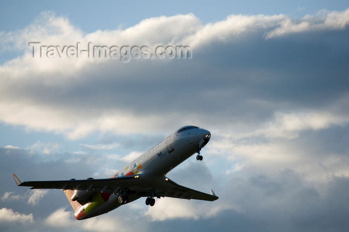 slovenia635: Slovenia - Brnik Airport: Adria Airways Canadair Regional Jet CRJ200LR S5-AAI airplane taking off from Ljubljana Joze Pucnik Airpor - photo by I.Middleton - (c) Travel-Images.com - Stock Photography agency - Image Bank