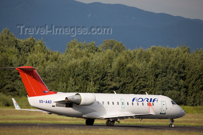 slovenia639: Slovenia - Brnik Airport: Adria Airways Canadair Regional Jet CRJ200LR S5-AAD taking off from Ljubljana Joze Pucnik Airport - photo by I.Middleton - (c) Travel-Images.com - Stock Photography agency - Image Bank