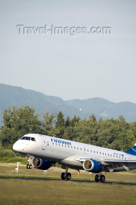 slovenia642: Slovenia - Brnik Airport: Finnair Embraer ERJ-190-100LR OH-LKH taking off from Ljubljana Joze Pucnik Airport - photo by I.Middleton - (c) Travel-Images.com - Stock Photography agency - Image Bank