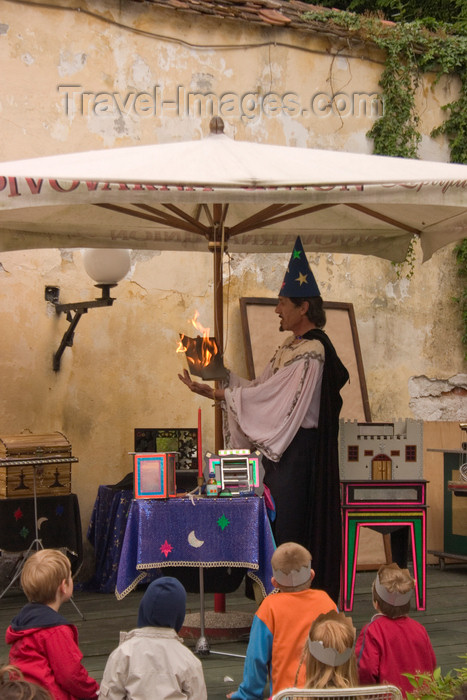 slovenia665: Slovenia - Kamnik Medieval Festival: magician entertaining children - photo by I.Middleton - (c) Travel-Images.com - Stock Photography agency - Image Bank