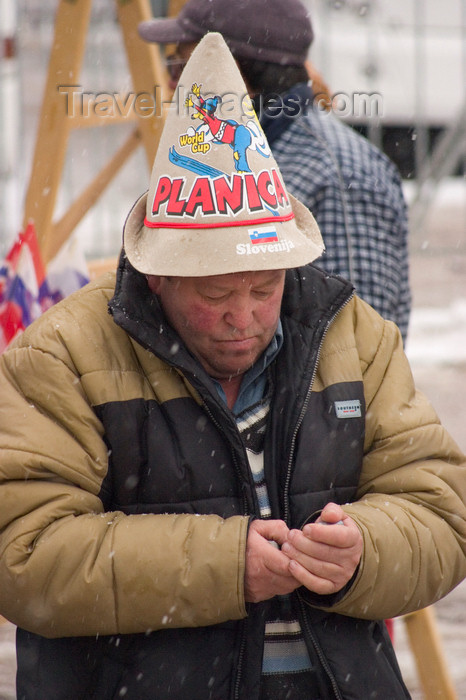 slovenia688: spectators using mobile phone - Planica ski jumping championships, Slovenia - photo by I.Middleton - (c) Travel-Images.com - Stock Photography agency - Image Bank