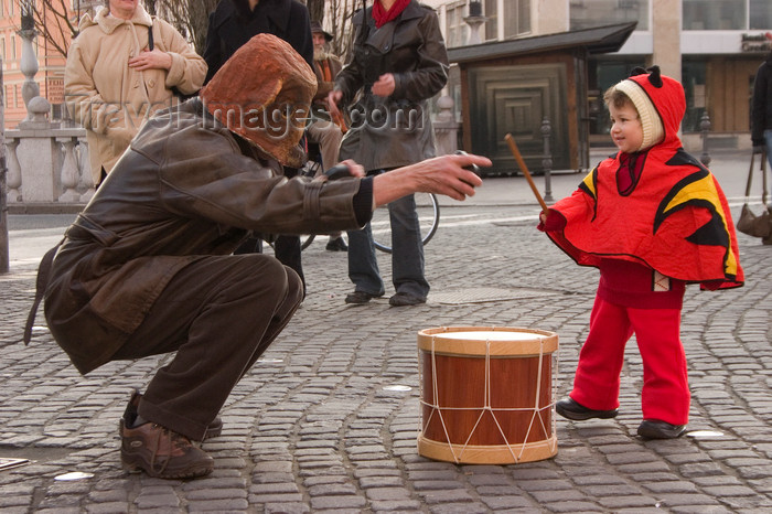 slovenia716: Slovenia - Ljubliana: Pust celebrations - drummer and monster - photo by I.Middleton - (c) Travel-Images.com - Stock Photography agency - Image Bank