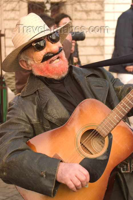 slovenia724: Slovenia - Ljubliana: Pust celebrations - guitar player - photo by I.Middleton - (c) Travel-Images.com - Stock Photography agency - Image Bank