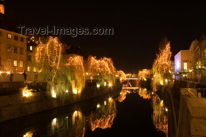 slovenia74: Christmas illuminations reflected on the river Ljubljanica, Ljubljana , Slovenia - photo by I.Middleton - (c) Travel-Images.com - Stock Photography agency - Image Bank