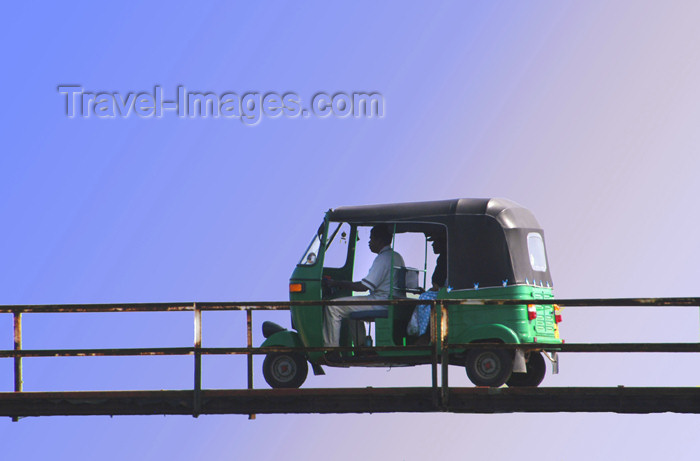 sri-lanka121: Colombo, Sri Lanka: Tuk Tuk crossing bridge - auto rickshaw - photo by B.Cain - (c) Travel-Images.com - Stock Photography agency - Image Bank