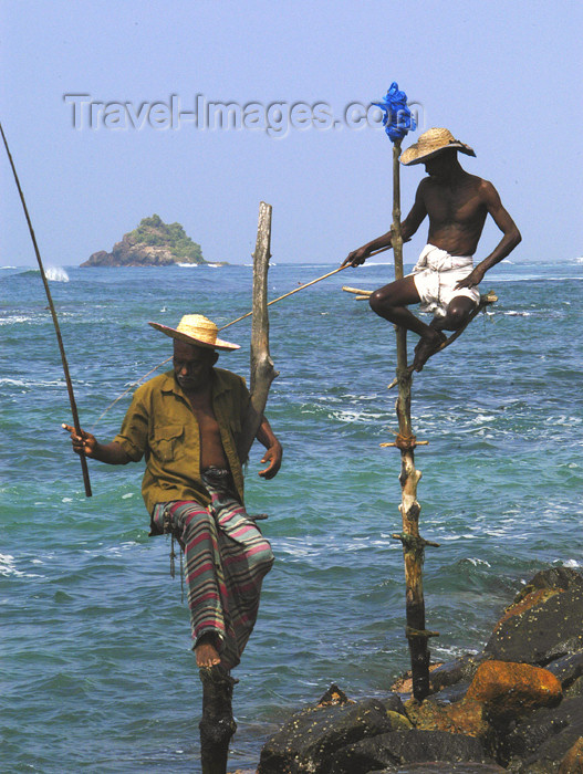 sri-lanka125: Sri Lanka - Two stilt fishermen, Weligama (photo by B.Cain) - (c) Travel-Images.com - Stock Photography agency - Image Bank