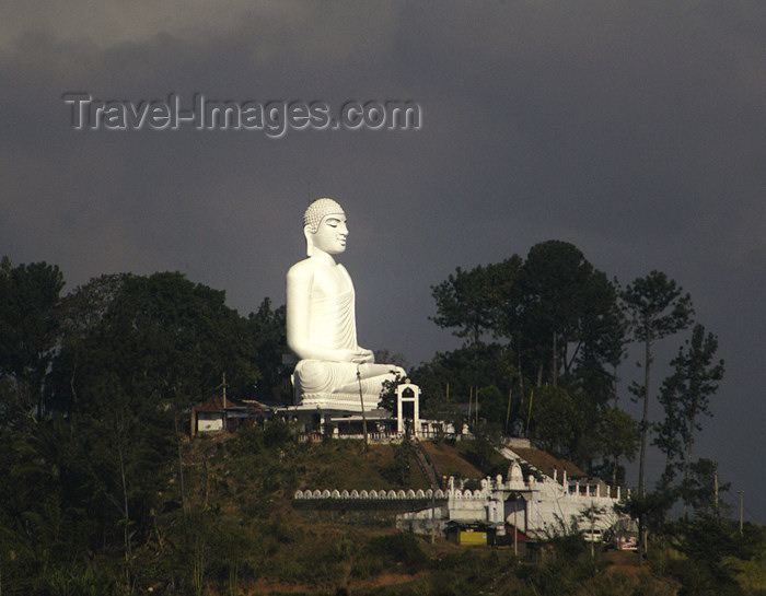 sri-lanka126: Kandy, Central Province, Sri Lanka: white hillside Buddha against a dark sky - photo by B.Cain - (c) Travel-Images.com - Stock Photography agency - Image Bank