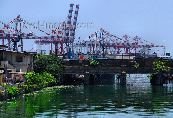 sri-lanka160: Colombo, Sri Lanka: Harbour cranes - Canal between Fort and Pettah districts, linking Beira Lake to the Harbour - photo by M.Torres - (c) Travel-Images.com - Stock Photography agency - Image Bank